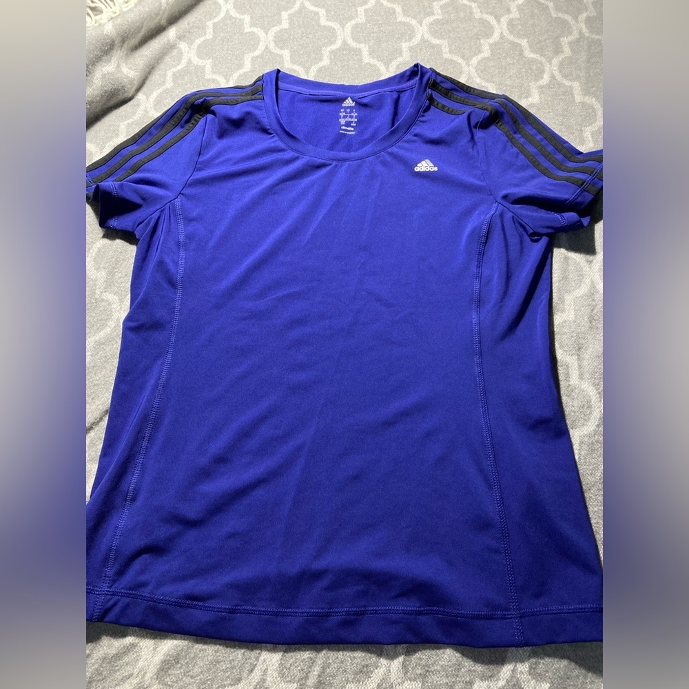 Like-new adidas short sleeve t-shirt. Colour is more blue than purple.
